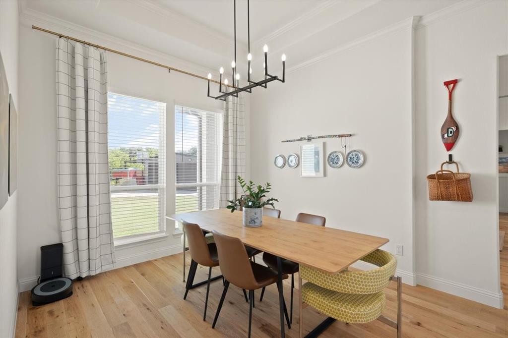 1028 Gatlin Circle Springtown, TX 76082 - Photo 11 of 30 a view of a dining room with furniture window and wooden floor
