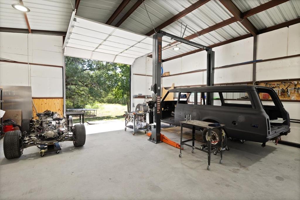 1028 Gatlin Circle Springtown, TX 76082 - Photo 27 of 30 a view of a garage with chairs