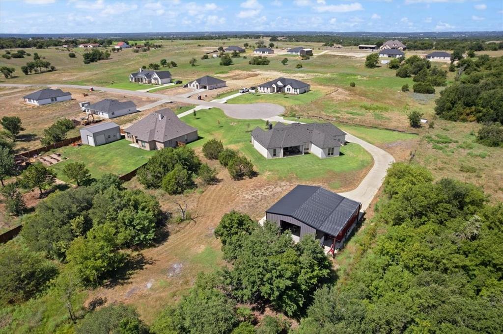 1028 Gatlin Circle Springtown, TX 76082 - Photo 30 of 30 an aerial view of a house with a garden