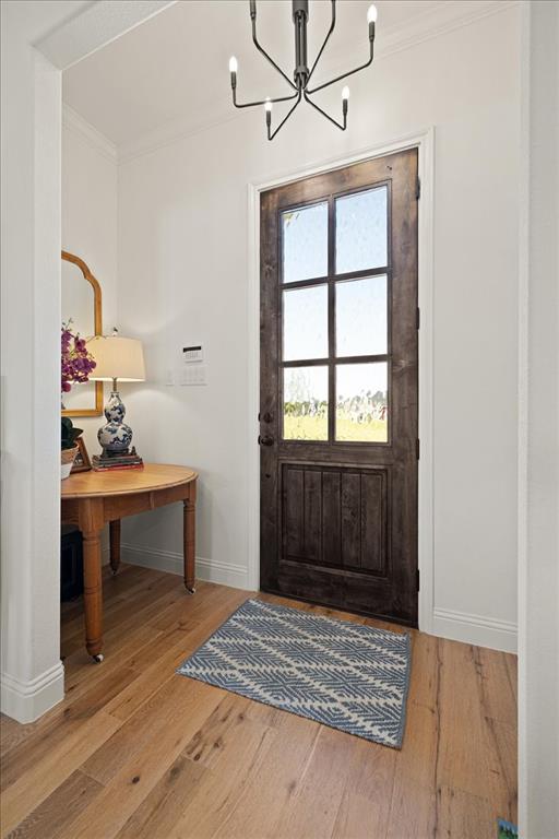 1028 Gatlin Circle Springtown, TX 76082 - Photo 3 of 30 a view of room with window and wooden floor