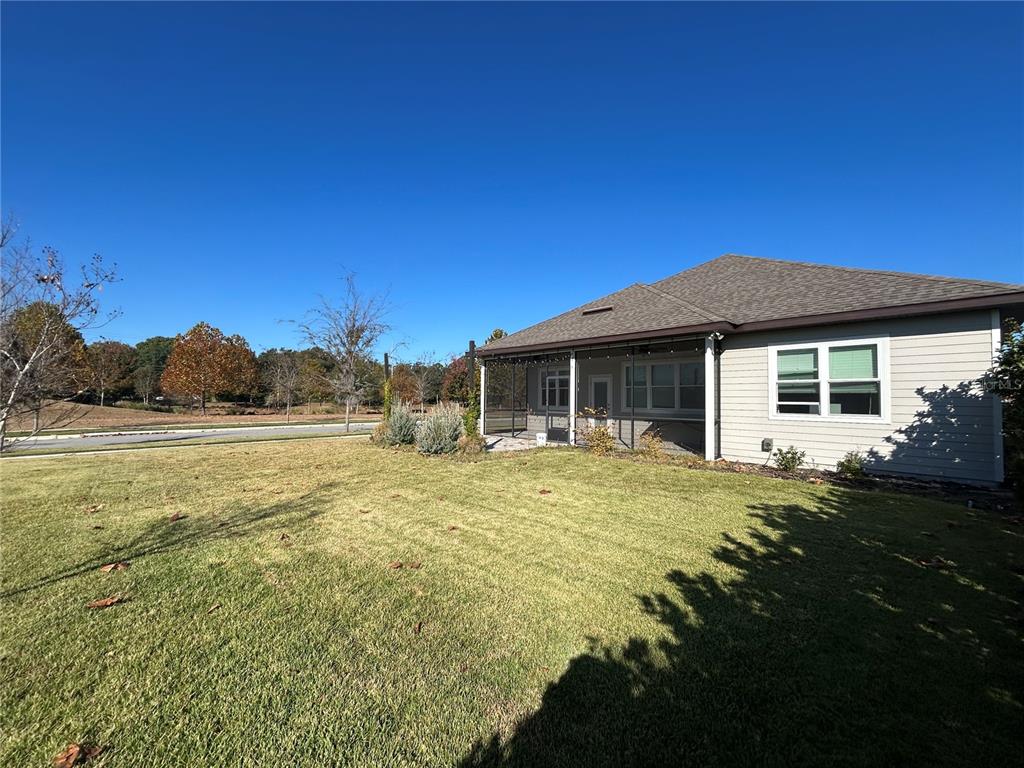 12101 Southwest 29 Place Gainesville, FL 32608 - Photo 26 of 26 a front view of a house with a garden