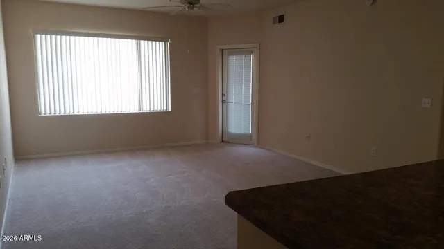 an empty room with windows