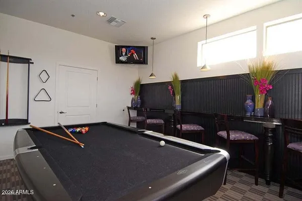 a room with furniture and screen