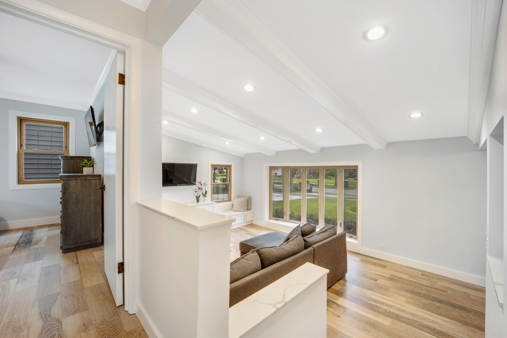 296 Herrick Road Riverside, IL 60546 - Photo 8 of 26 a living room with furniture and a flat screen tv