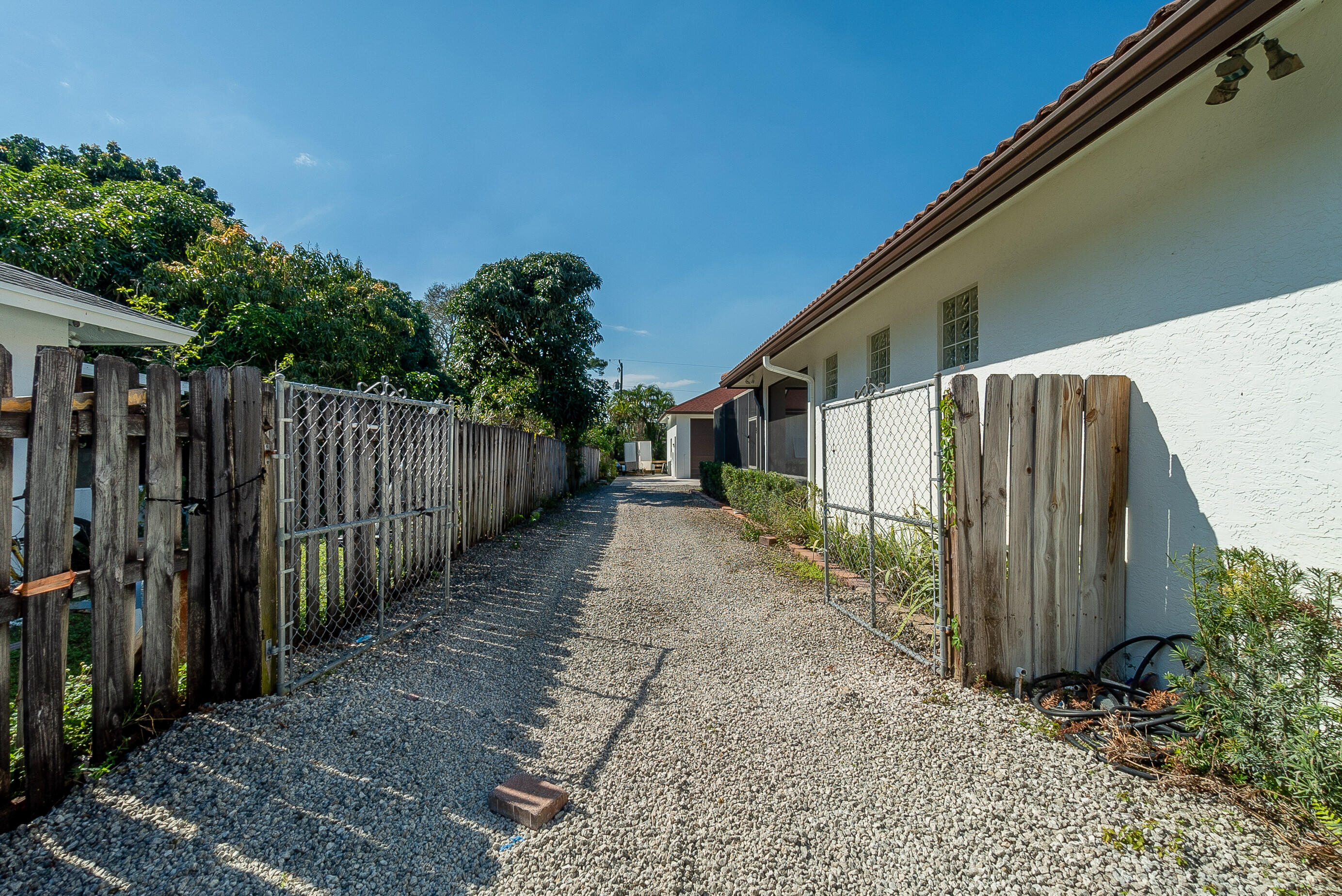 5587 1st Road Lake Worth, FL 33467 - Photo 46 of 50 049_Driveway to Rear Garage Bldg