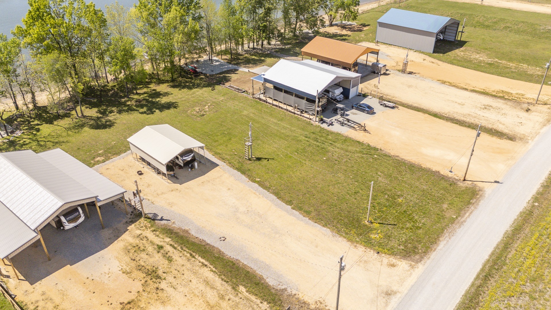 855 Hardin Bottom River Road Clifton, TN 38425 - Photo 1 of 30 a view of a swimming pool with a patio