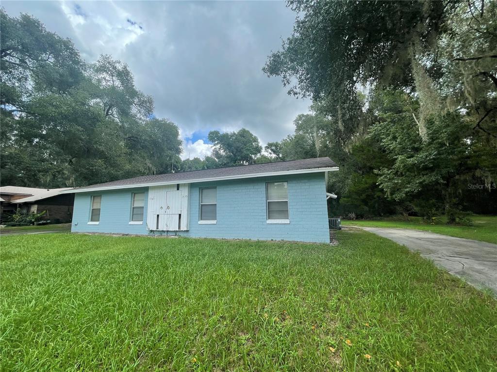 1575 South High Street DeLand, FL 32720 - Photo 1 of 1 a house that has a lot of plants in it