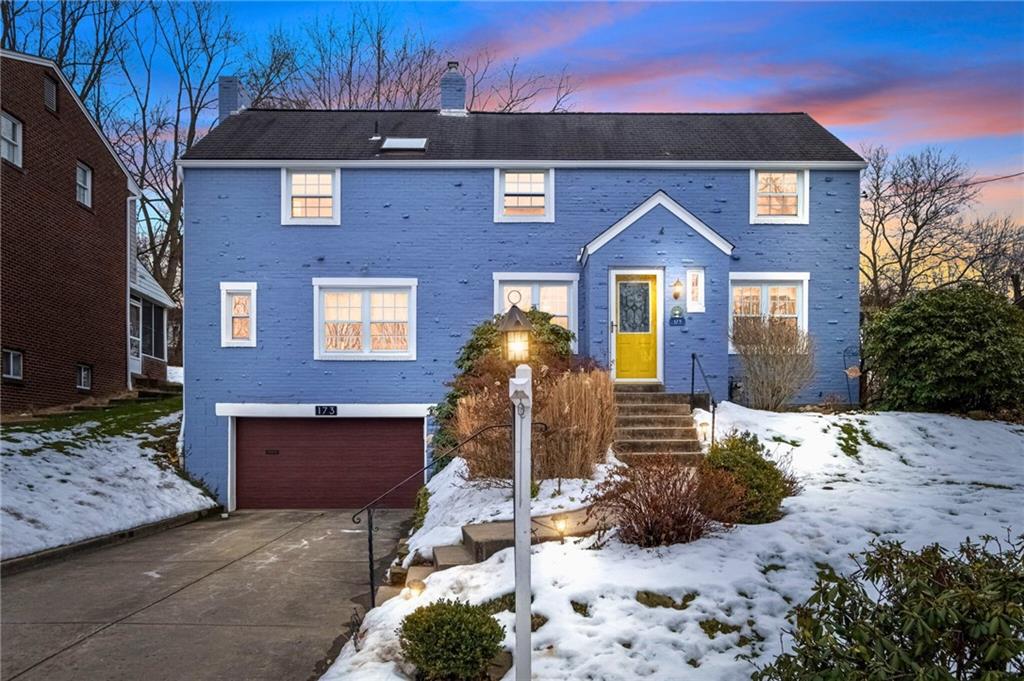 173 Spring Grove Road Pittsburgh, PA 15235 - Photo 1 of 30 a front view of a house with a yard