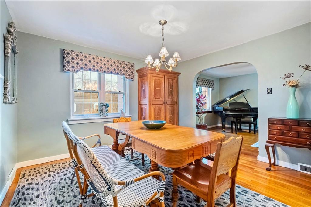 173 Spring Grove Road Pittsburgh, PA 15235 - Photo 11 of 30 a view of a dining room with furniture and window
