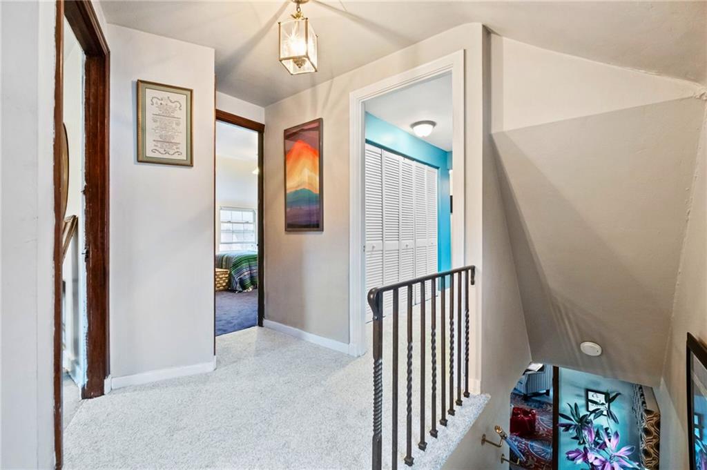 173 Spring Grove Road Pittsburgh, PA 15235 - Photo 16 of 30 a view of a hallway with a workspace
