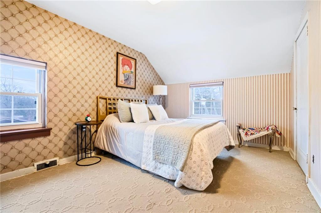 173 Spring Grove Road Pittsburgh, PA 15235 - Photo 21 of 30 a bedroom with a bed and window