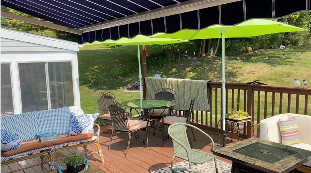 173 Spring Grove Road Pittsburgh, PA 15235 - Photo 25 of 30 a backyard of a house with table and chairs