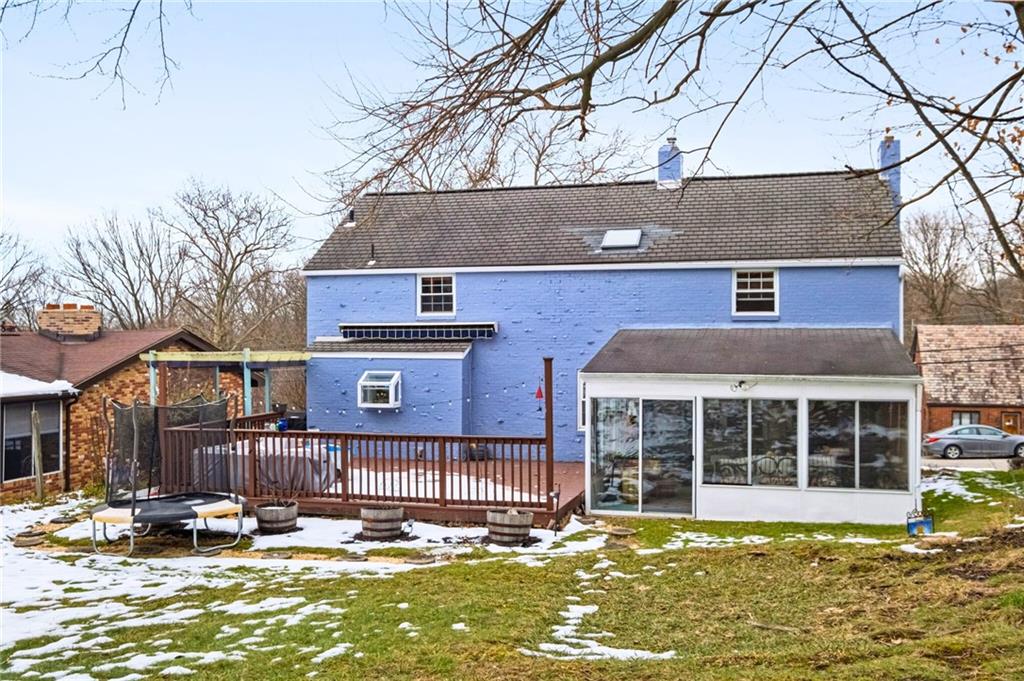 173 Spring Grove Road Pittsburgh, PA 15235 - Photo 27 of 30 a front view of a house with swimming pool and large trees