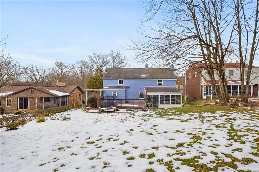 173 Spring Grove Road Pittsburgh, PA 15235 - Photo 28 of 30 a front view of a house with a yard covered with snow in front of house