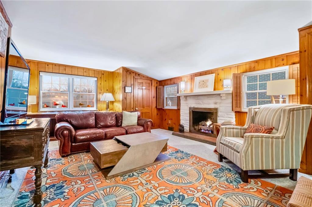 173 Spring Grove Road Pittsburgh, PA 15235 - Photo 3 of 30 a living room with furniture fireplace and a large window