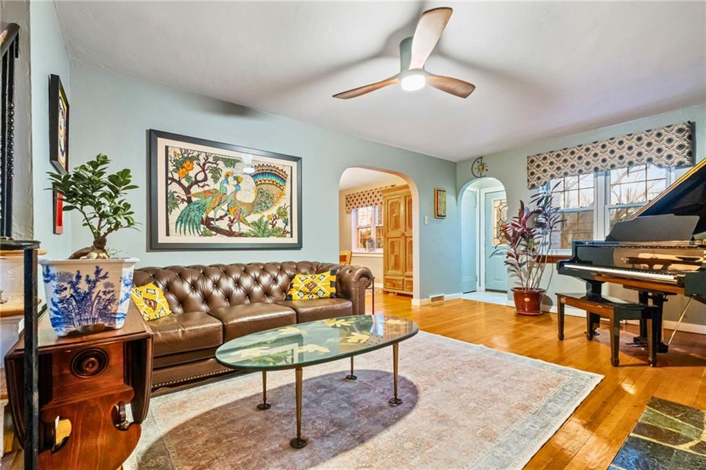 173 Spring Grove Road Pittsburgh, PA 15235 - Photo 10 of 30 a living room with furniture and wooden floor