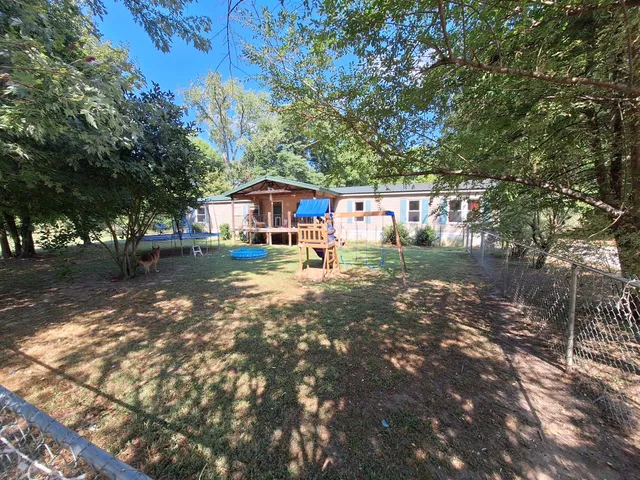 a view of pool with outdoor seating
