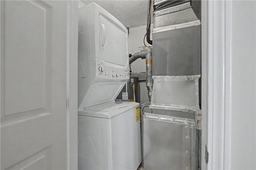 3399 Post Road, Unit 14 Warwick, RI 02886 - Photo 12 of 23 HALL CLOSET WITH STACKABLE WASHER/DRYER, NEW HEATING/AC UNIT, HOT WATER HEATER