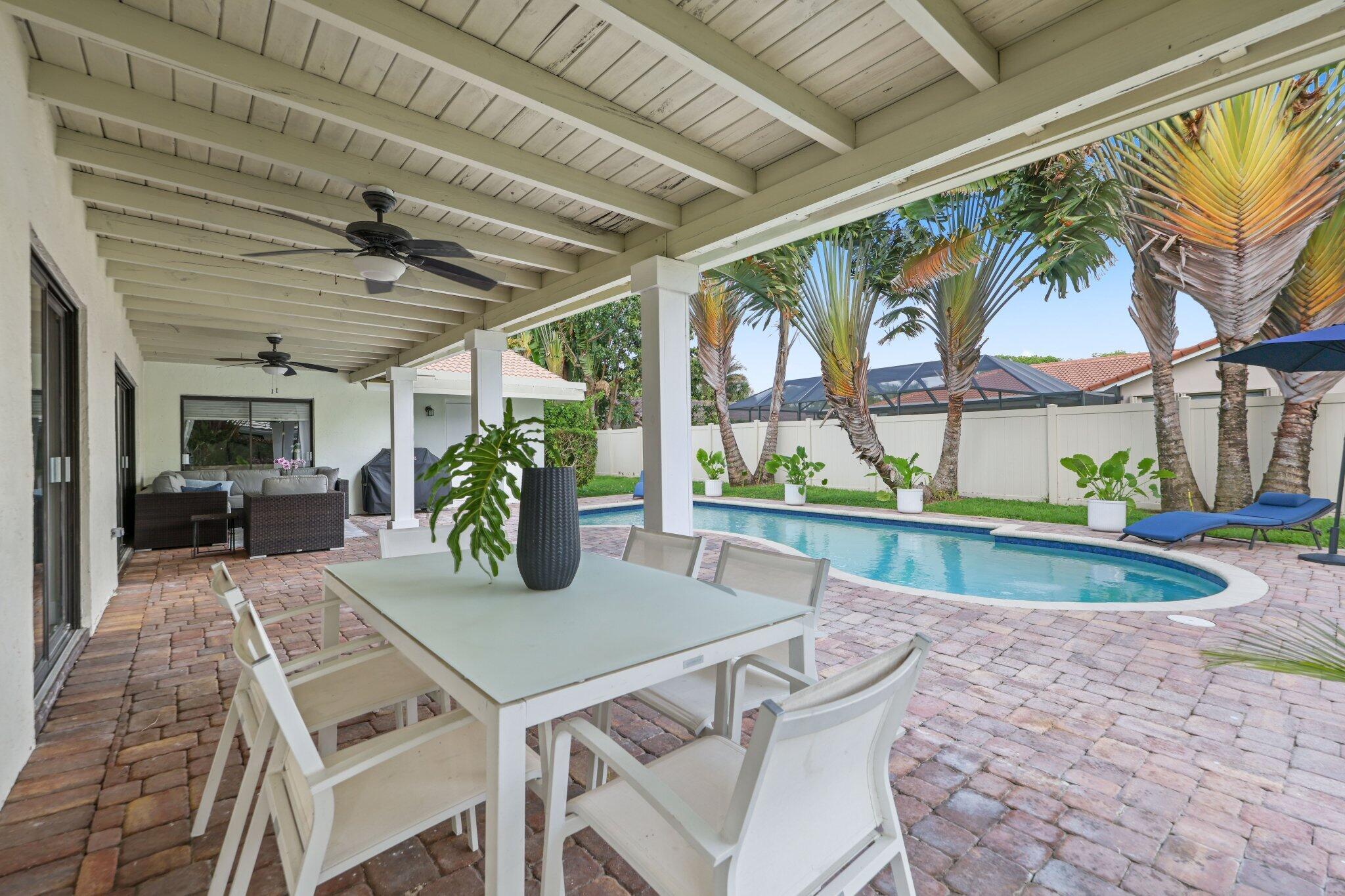 20898 Encanto Court Boca Raton, FL 33433 - Photo 48 of 67 Outdoor Dining + Pool