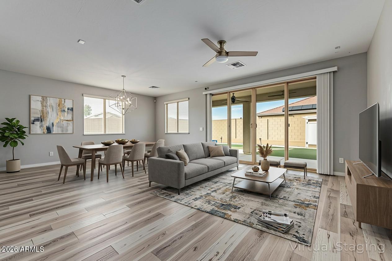 15768 West Pierce Street Goodyear, AZ 85338 - Photo 15 of 38 Great Room Virtually Staged