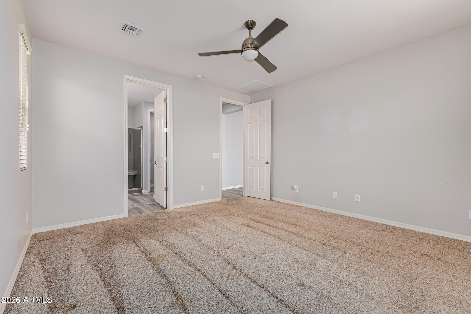 15768 West Pierce Street Goodyear, AZ 85338 - Photo 18 of 38 Primary Bedroom