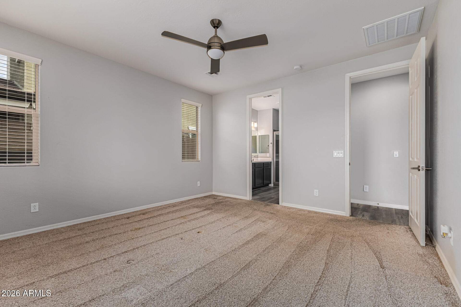 15768 West Pierce Street Goodyear, AZ 85338 - Photo 19 of 38 Primary Bedroom