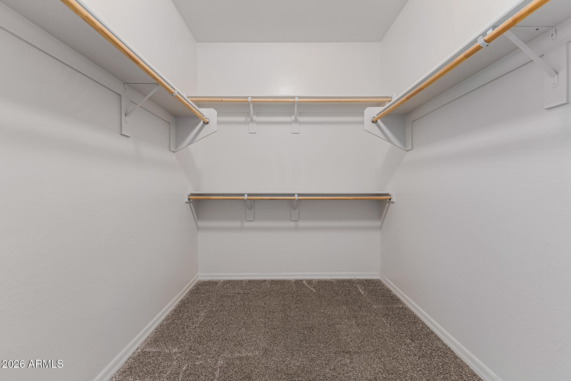 15768 West Pierce Street Goodyear, AZ 85338 - Photo 22 of 38 Primary Walk-in Closet