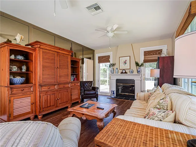 a bedroom with furniture and a fireplace