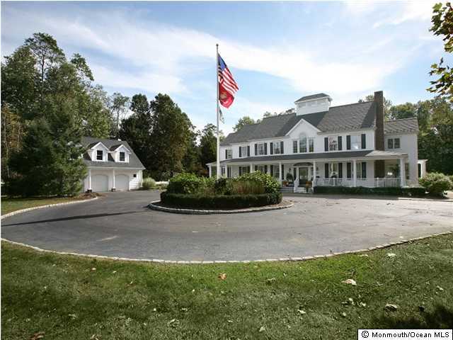 3 Bucklin Road Colts Neck, NJ 07722 - Photo 1 of 3 a view of a house with a yard and potted plants