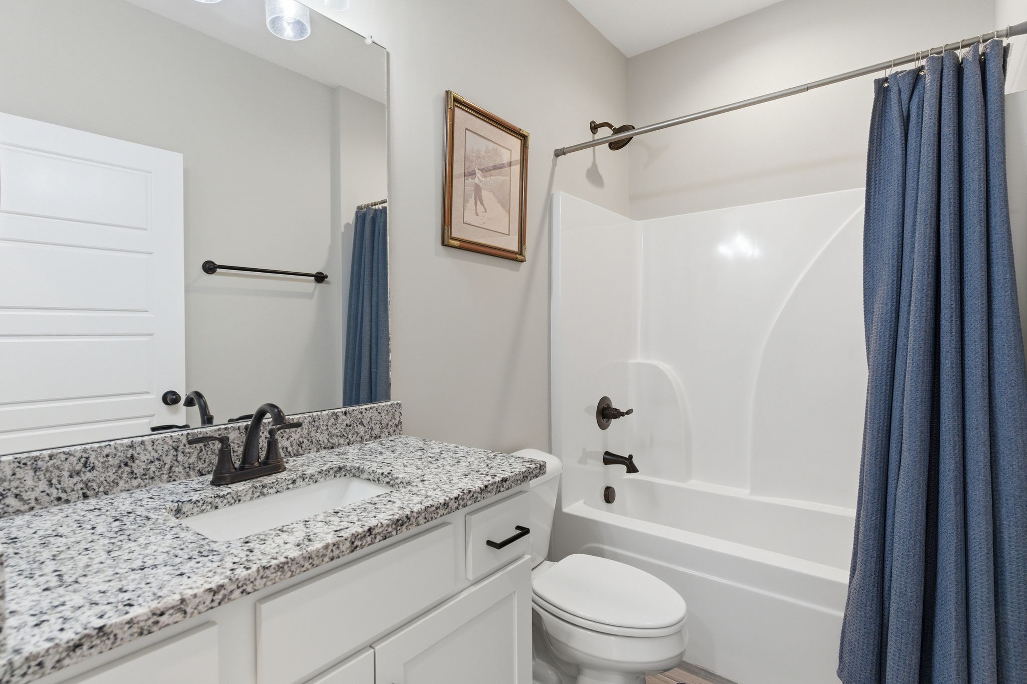 217 Julia Ann Court Springfield, TN 37172 - Photo 11 of 26 a bathroom with a granite countertop sink toilet and shower