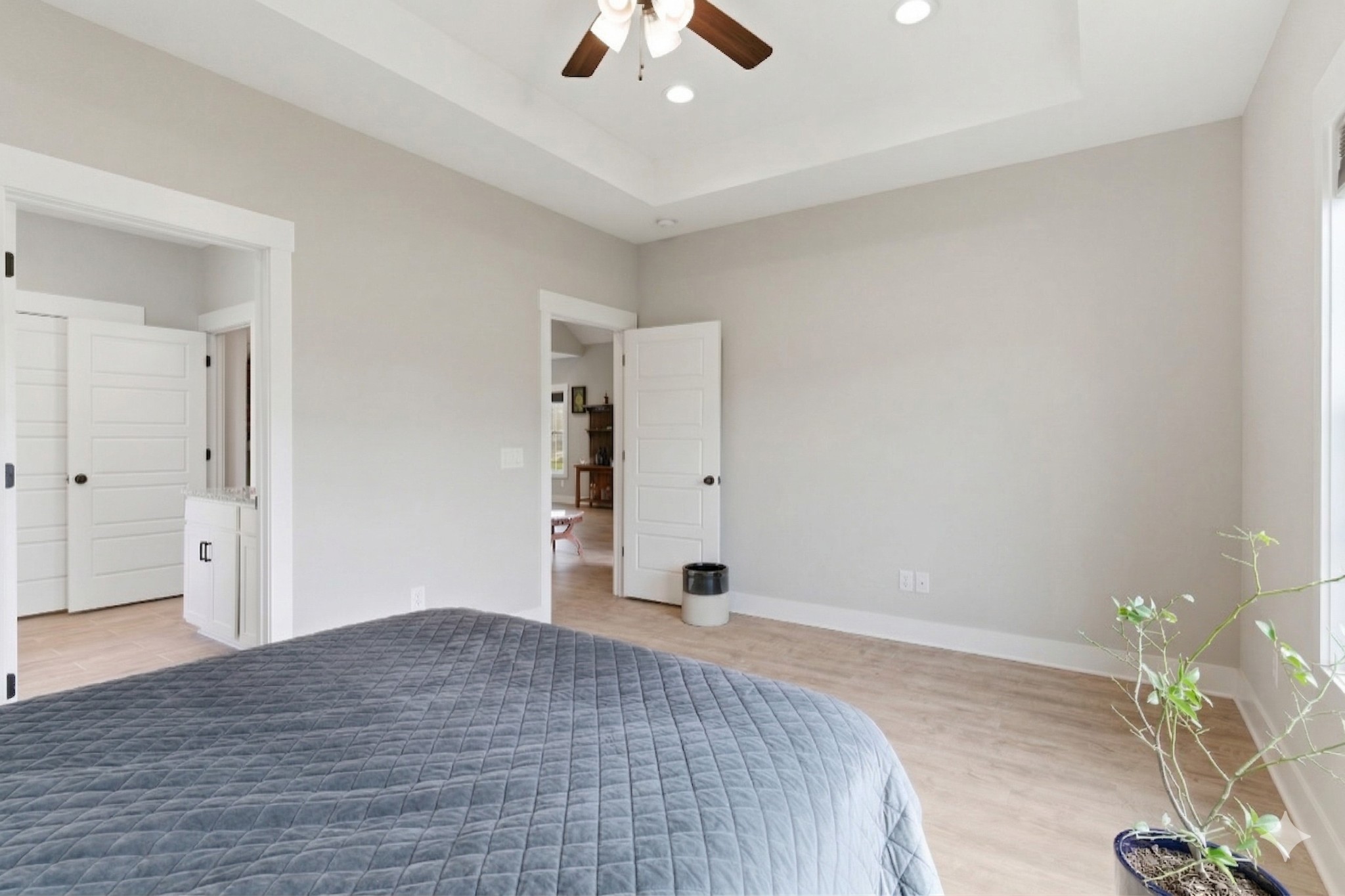 217 Julia Ann Court Springfield, TN 37172 - Photo 13 of 26 a bedroom with a bed and a chandelier