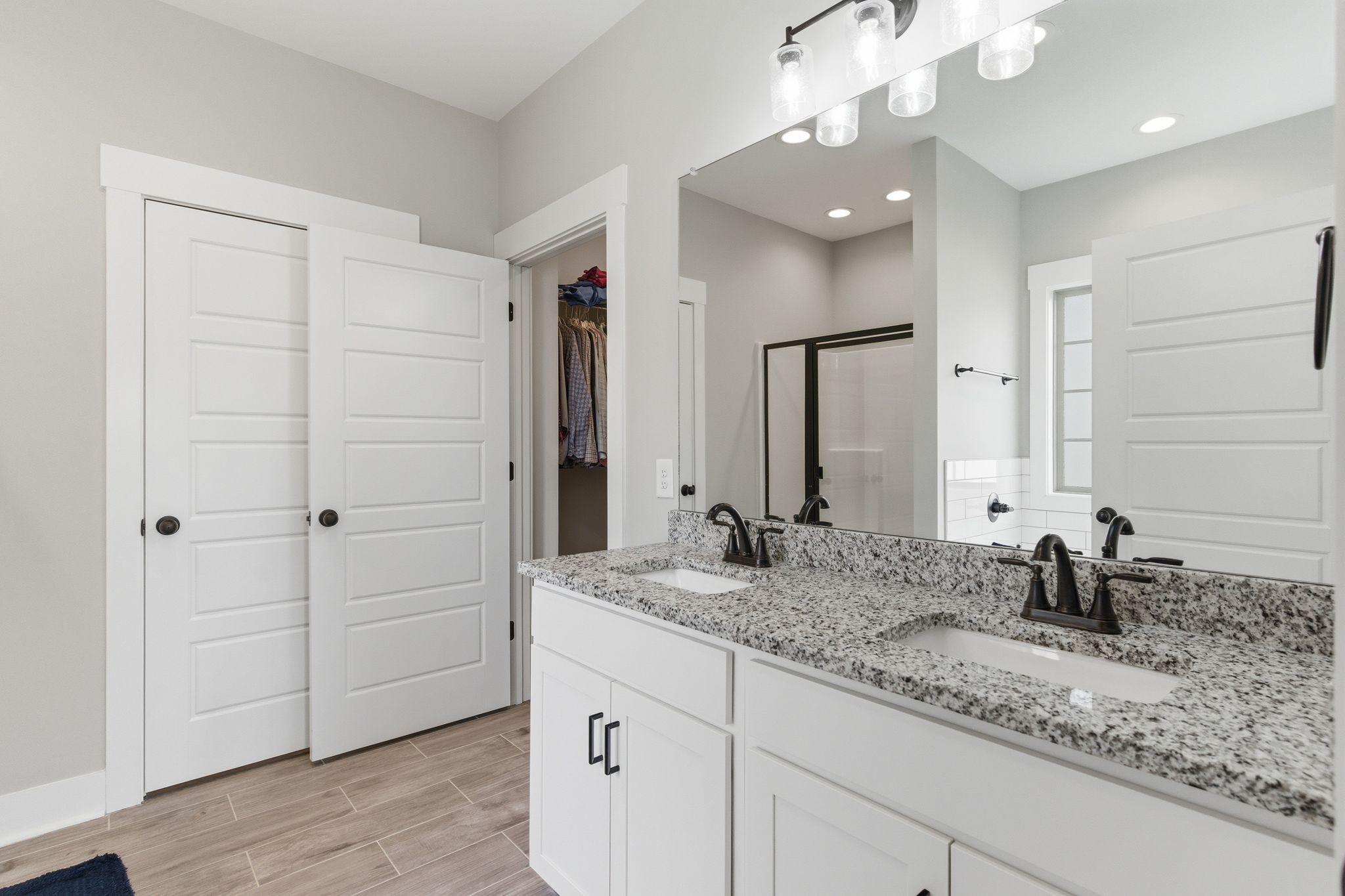 217 Julia Ann Court Springfield, TN 37172 - Photo 14 of 26 a bathroom with a sink and a mirror