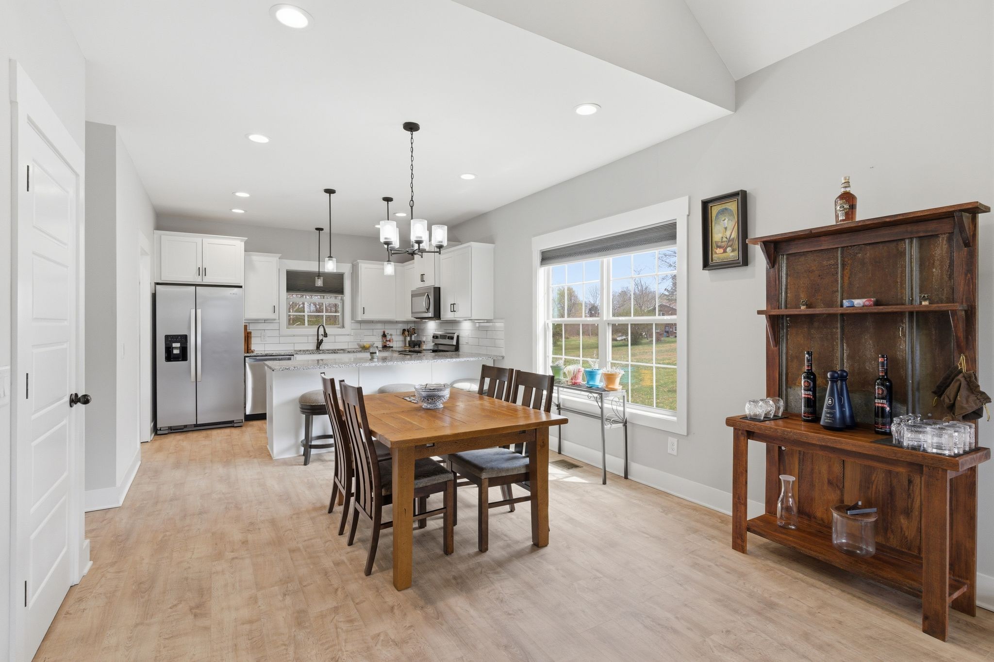 217 Julia Ann Court Springfield, TN 37172 - Photo 6 of 26 a kitchen with stainless steel appliances kitchen island granite countertop a sink and a refrigerator