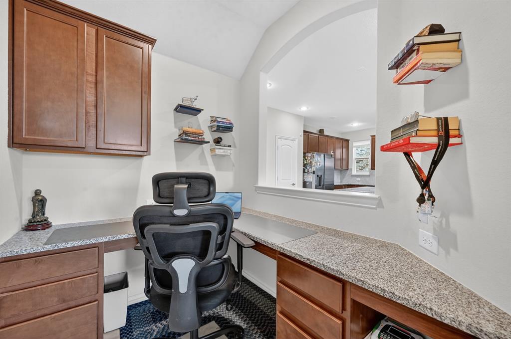 11320 Twisting Peak Road Fort Worth, TX 76052 - Photo 6 of 23 a kitchen with a sink cabinets and wooden floor