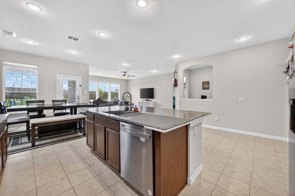 11320 Twisting Peak Road Fort Worth, TX 76052 - Photo 9 of 23 a kitchen with a sink and counter top space