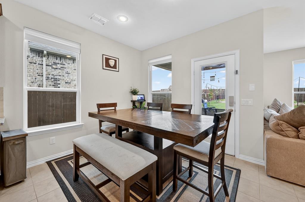 11320 Twisting Peak Road Fort Worth, TX 76052 - Photo 10 of 23 a view of a dining room with furniture