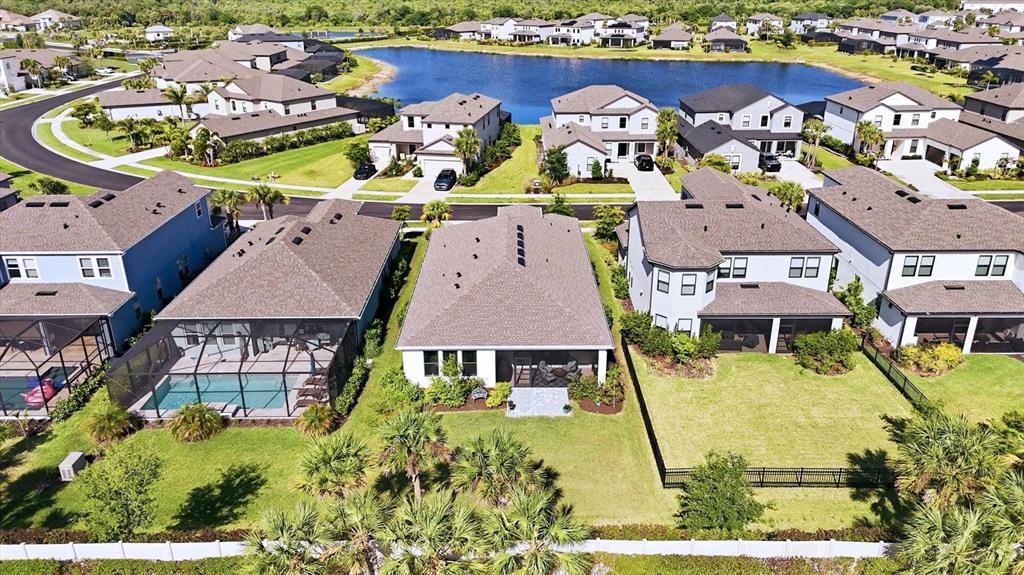 9268 Tequila Sunrise Drive Sarasota, FL 34241 - Photo 35 of 56 an aerial view of a house with a swimming pool yard and outdoor seating