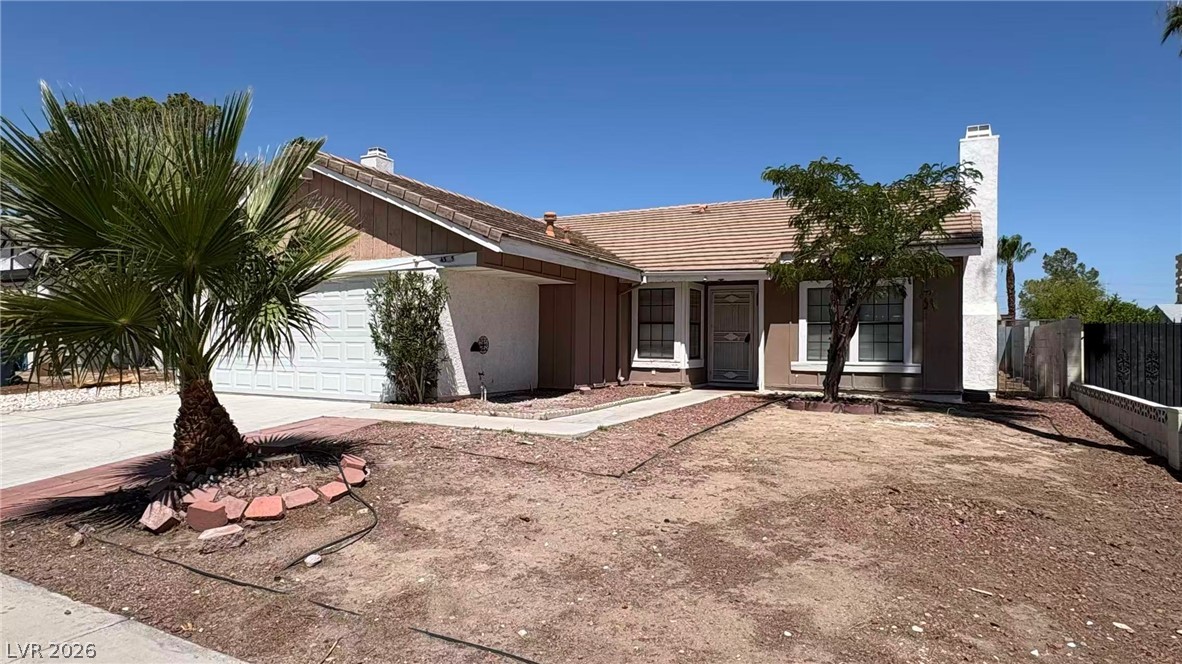 4325 Newcastle Road Las Vegas, NV 89103 - Photo 3 of 18 A classic ranch-style home featuring a two-car garage and a low-maintenance yard.