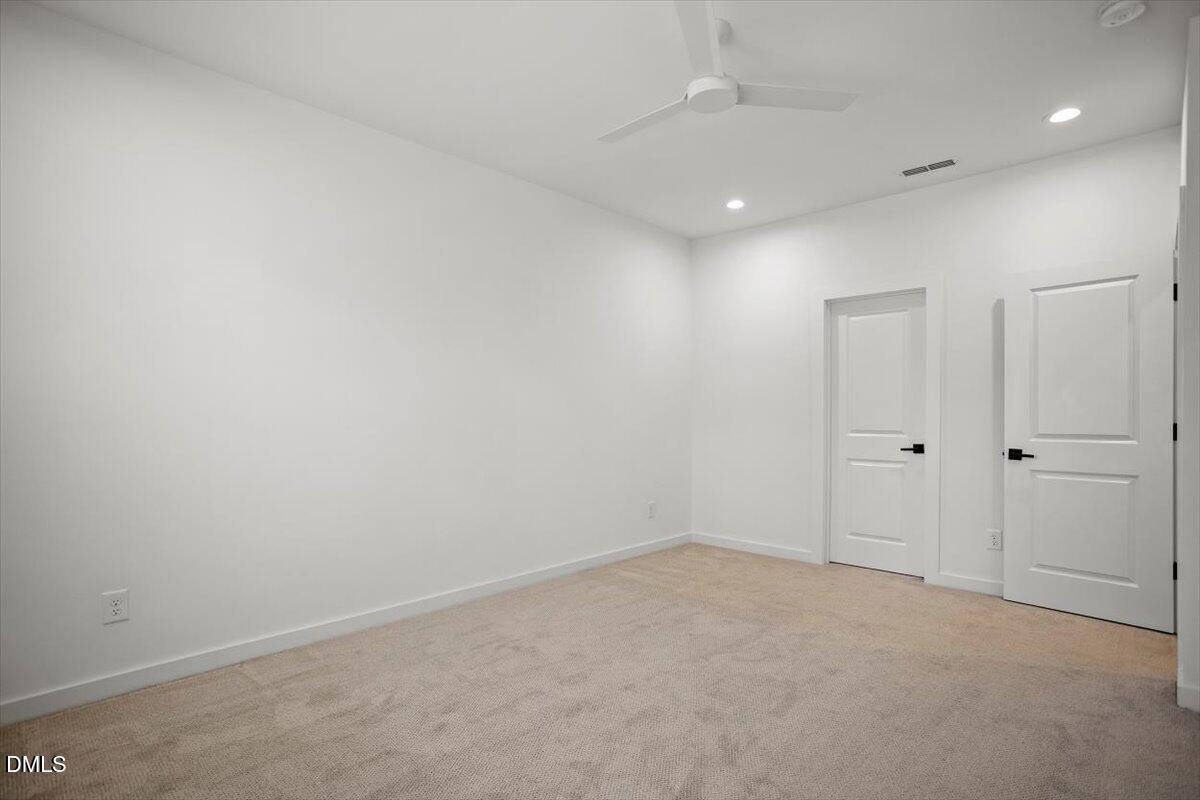 6419 Tanner Oak Lane Raleigh, NC 27613 - Photo 25 of 39 a view of an empty room