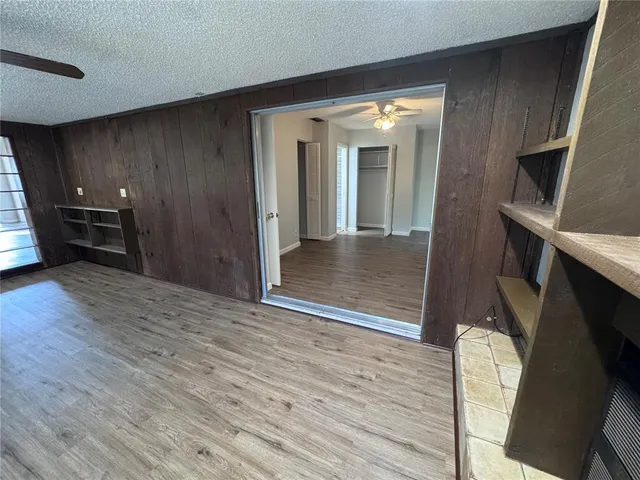 a view of livingroom with furniture and wooden floor