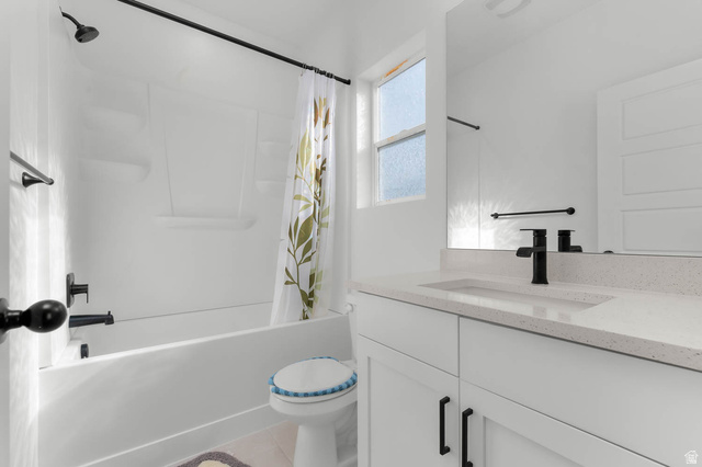 8307 Durham Street Sandy, UT 84070 - Photo 15 of 29 White vanity with an integrated sink and light-colored countertop