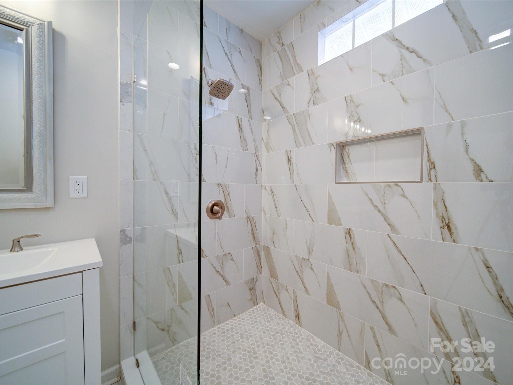 113 Graham Street Chester, SC 29706 - Photo 12 of 22 a bathroom with a shower and a sink