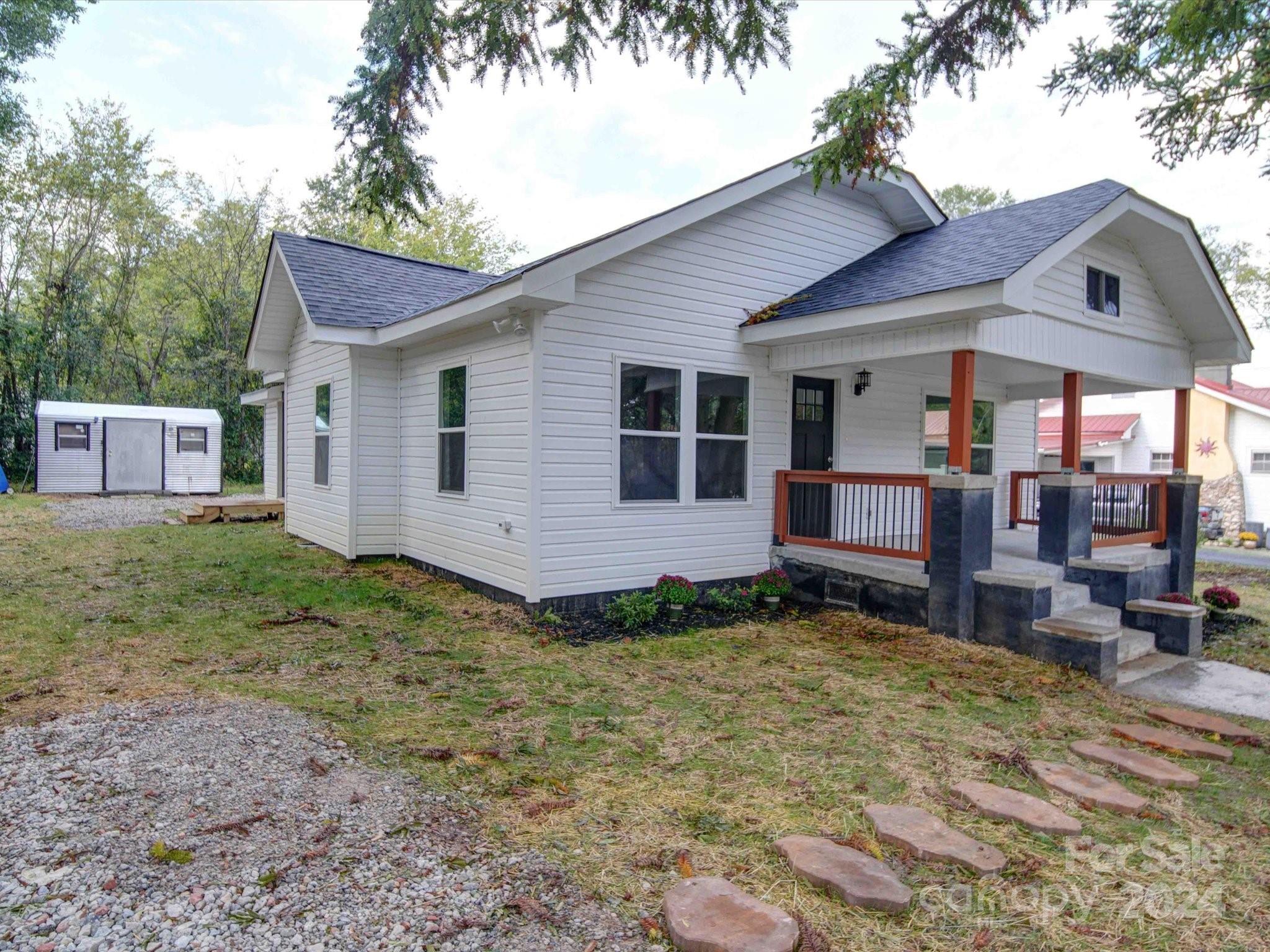 113 Graham Street Chester, SC 29706 - Photo 2 of 22 a backyard of a house with yard and outdoor seating