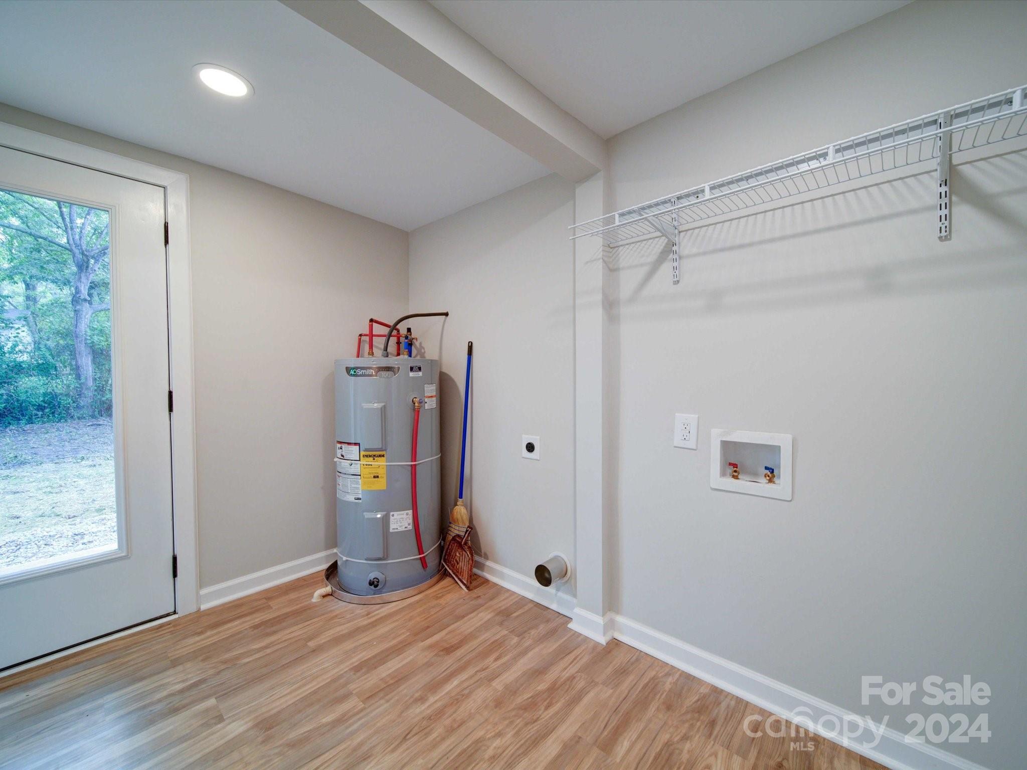 113 Graham Street Chester, SC 29706 - Photo 21 of 22 a view of empty room with wooden floor and window