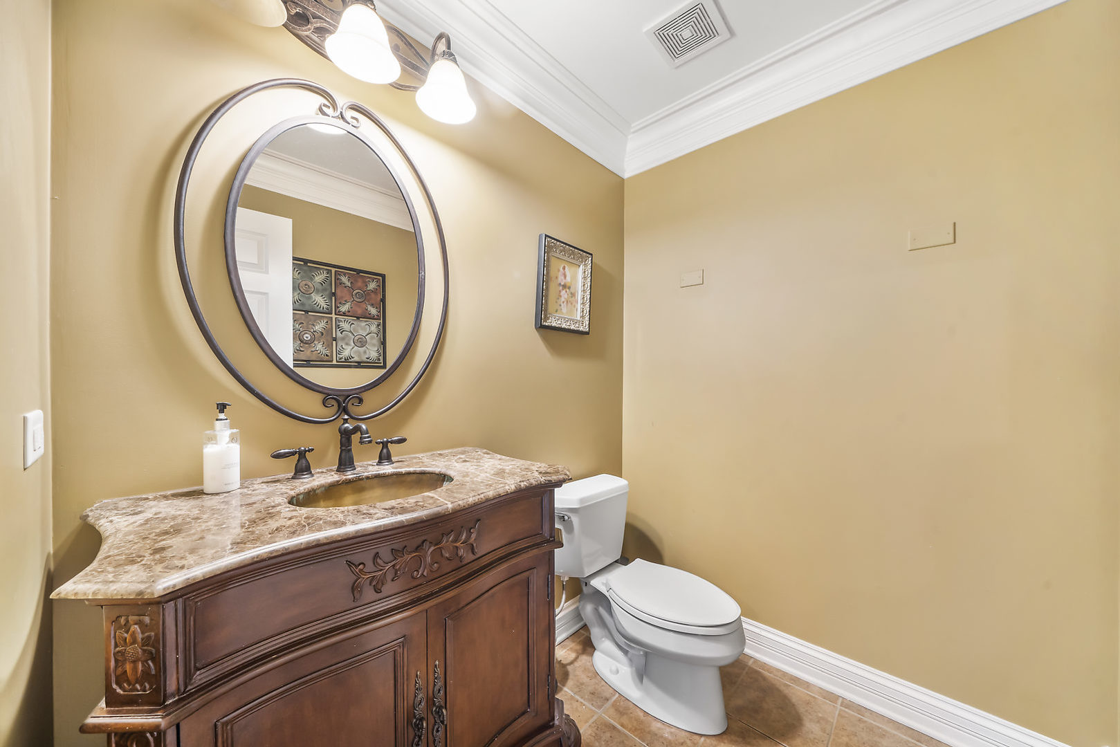 40W885 Campton Trail Road St. Charles, IL 60175 - Photo 13 of 29 a bathroom with a granite countertop toilet a sink and a mirror