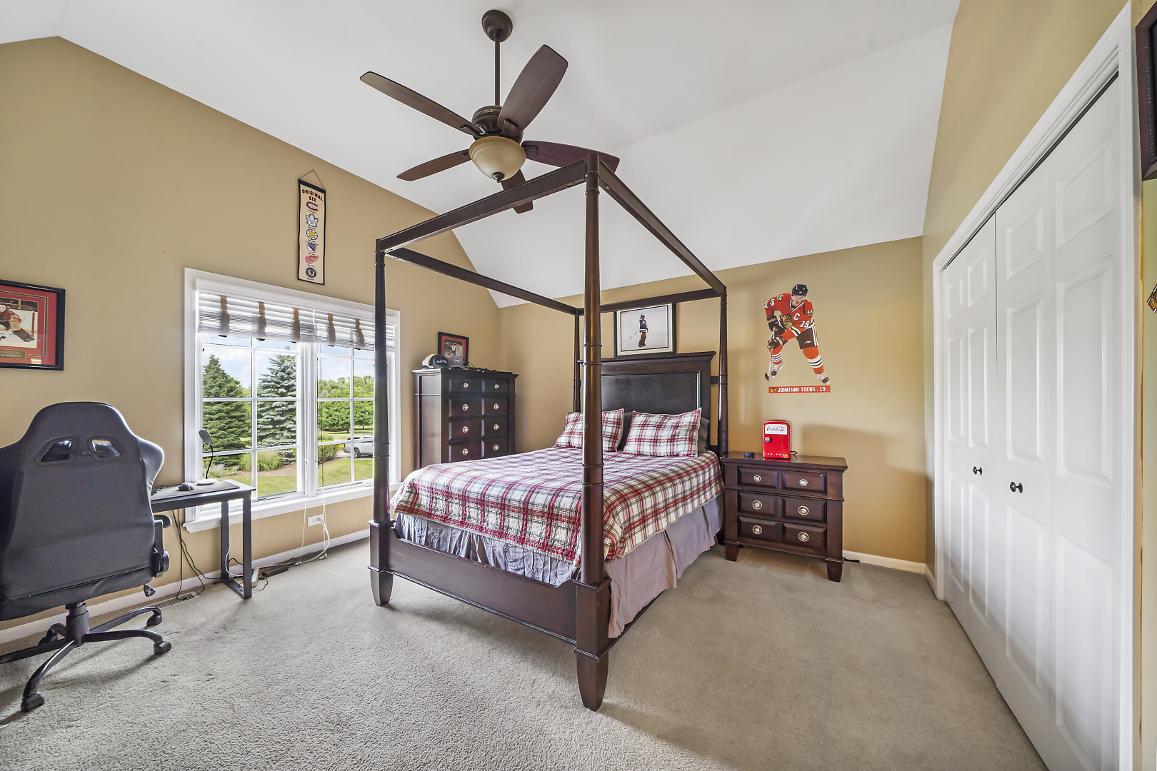 40W885 Campton Trail Road St. Charles, IL 60175 - Photo 19 of 29 a bedroom with a bed window and a ceiling fan