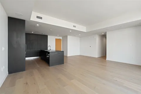 a kitchen with a stove and a microwave