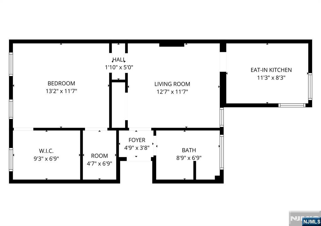 14-16 Crown Street Bloomfield, NJ 07003 - Photo 24 of 27 a picture of a wall with a white wall and a white refrigerator