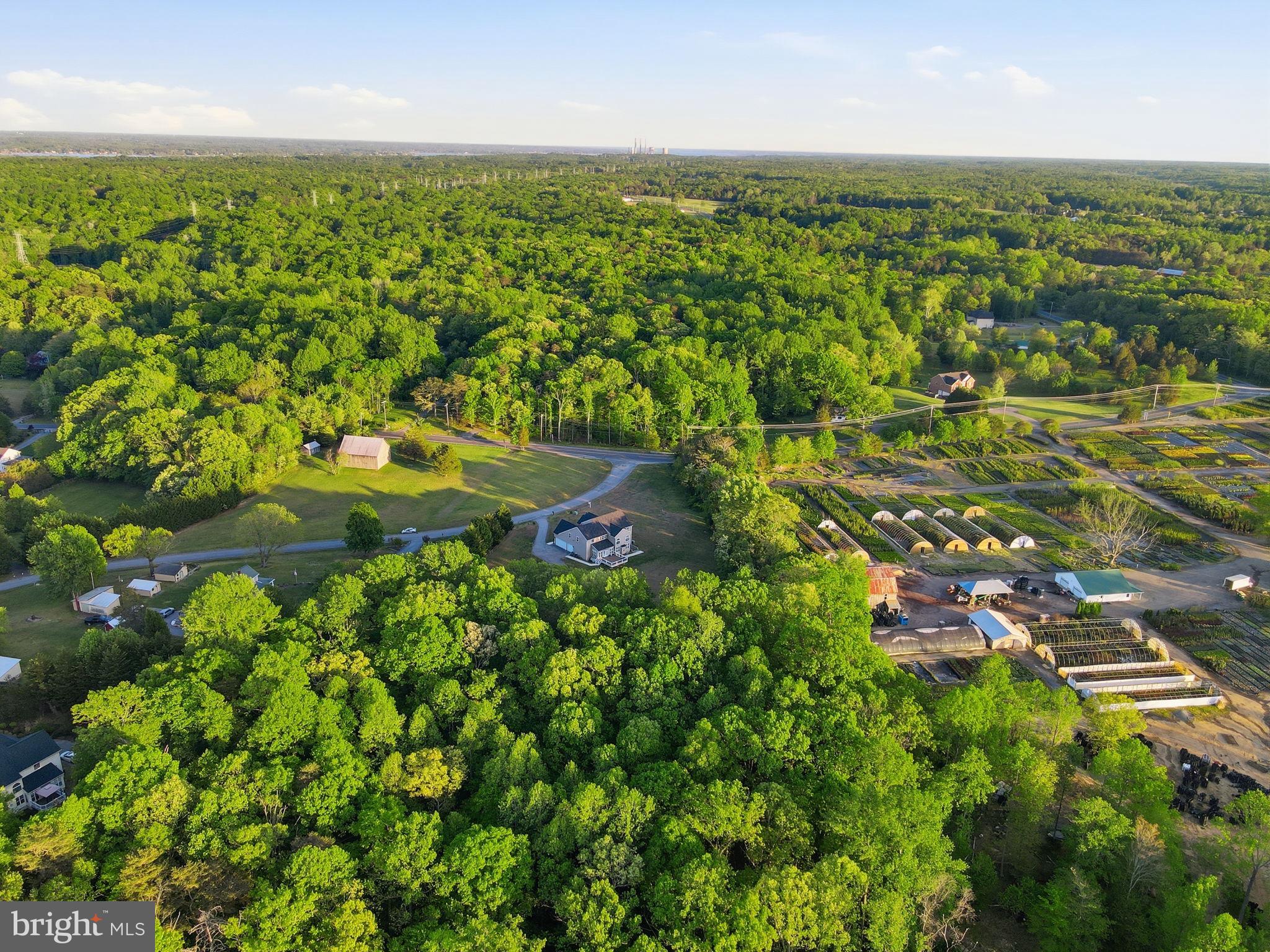 19081 Poplar Ridge Road Brandywine, MD 20613 - Photo 14 of 64 an aerial view of residential houses with outdoor space and trees