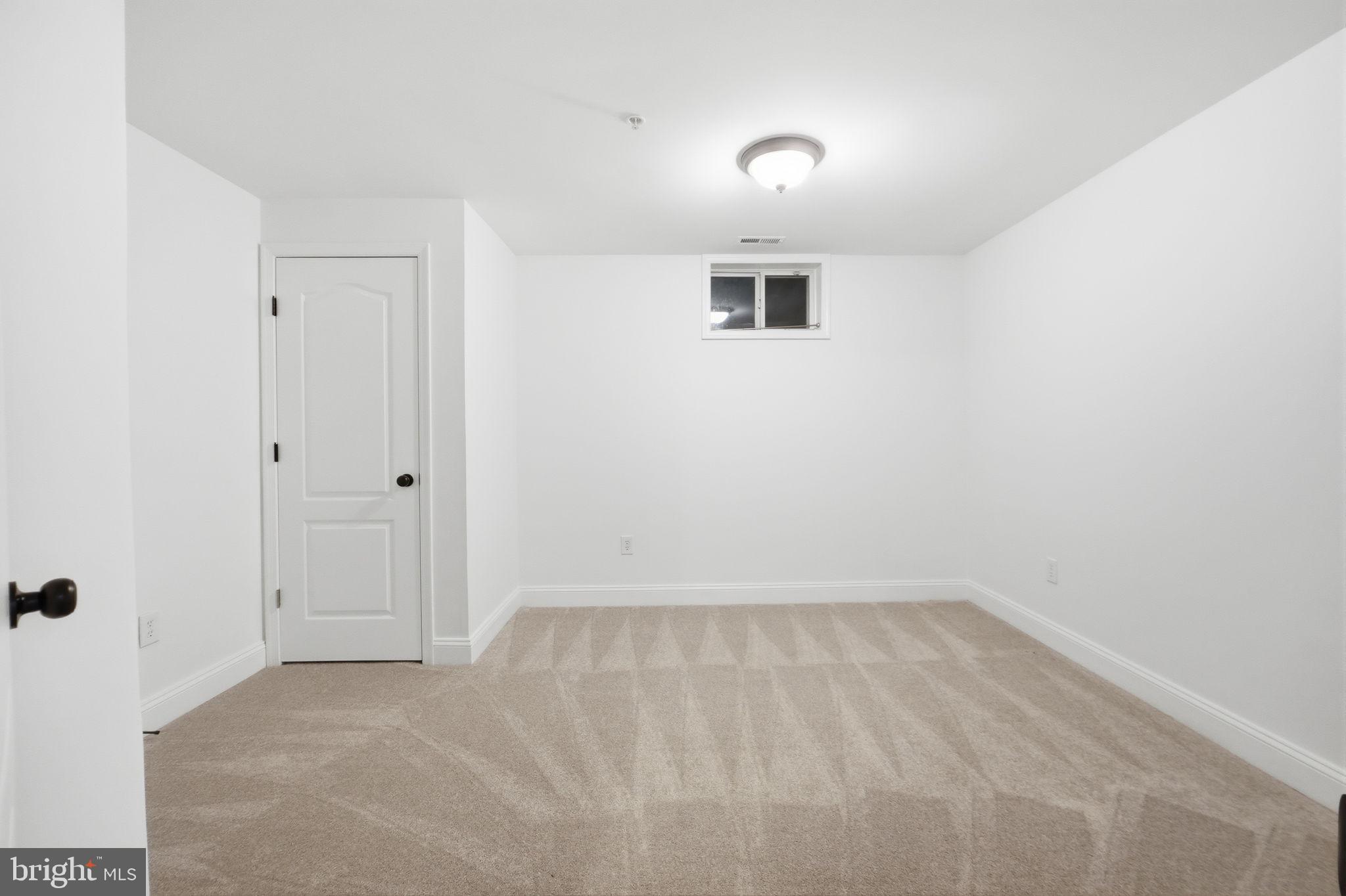 19081 Poplar Ridge Road Brandywine, MD 20613 - Photo 60 of 64 a view of a small space with wooden floor